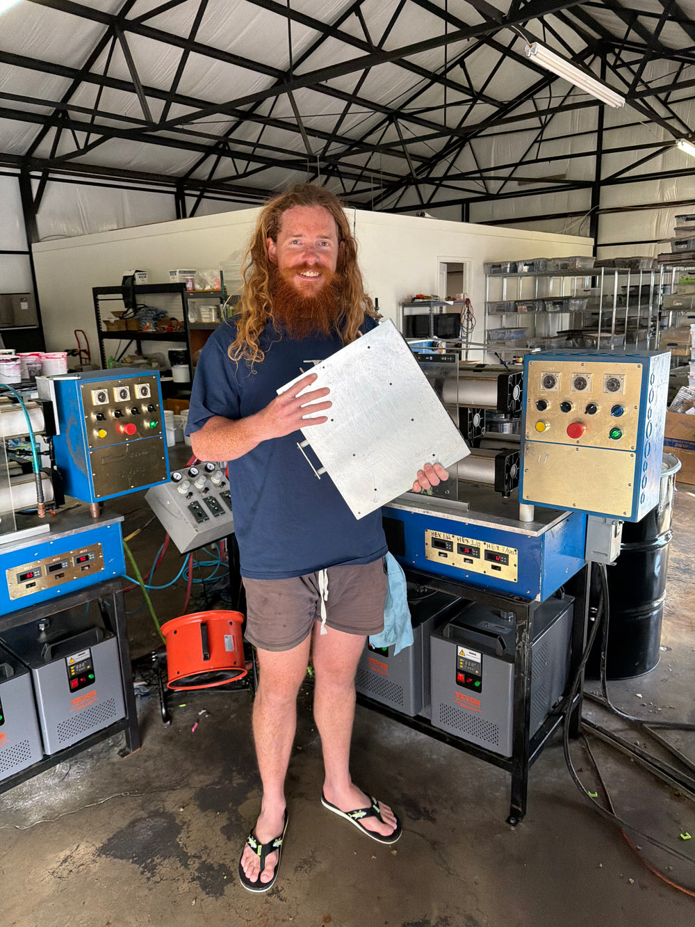 Montgomery on the production floor with the lure machines